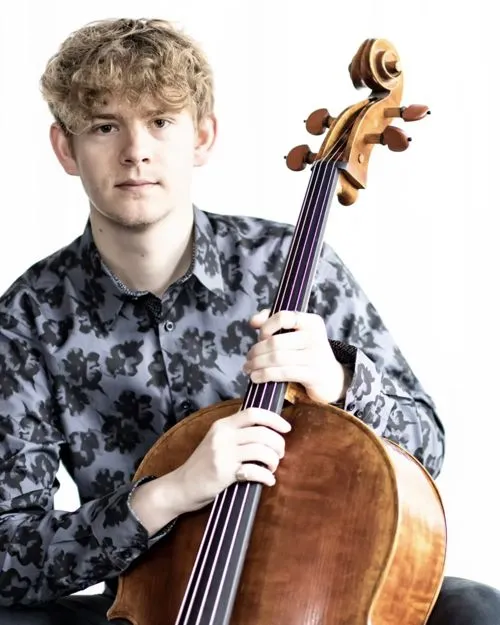 George Wilkes with his cello